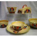 A Clarice Cliff crocus pattern cheese dish together with a similarly decorated plate and four bowls,