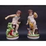 A pair of continental porcelain figures of cherubs,