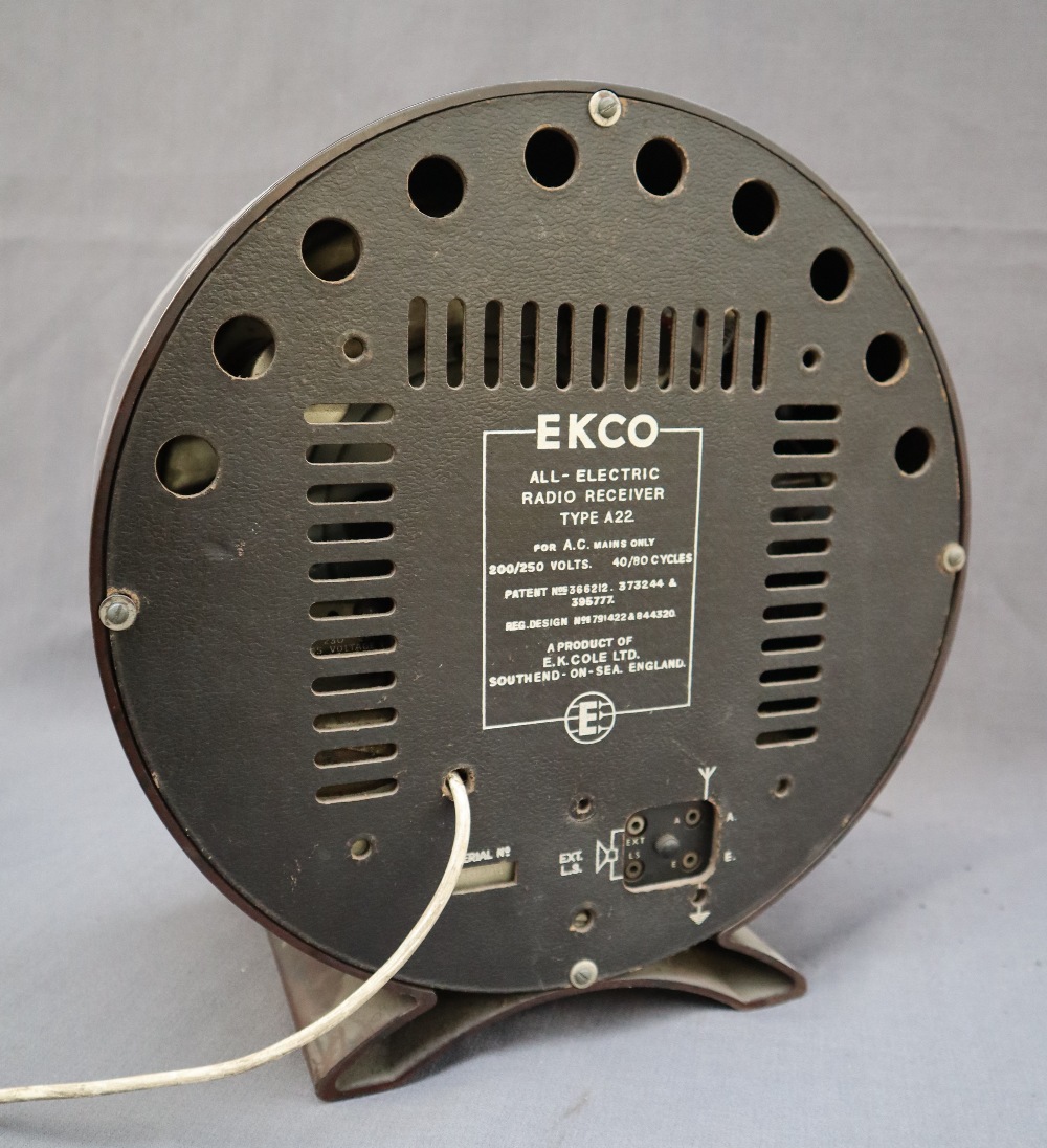 An Ekco all electric radio receiver Type A22 with a circular bakelite casing, and knobs, - Image 7 of 12