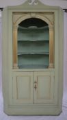 A George III painted pine corner cabinet,