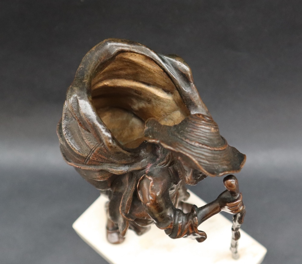 A bronze model of an elderly man with an open sack on his back, - Image 3 of 7