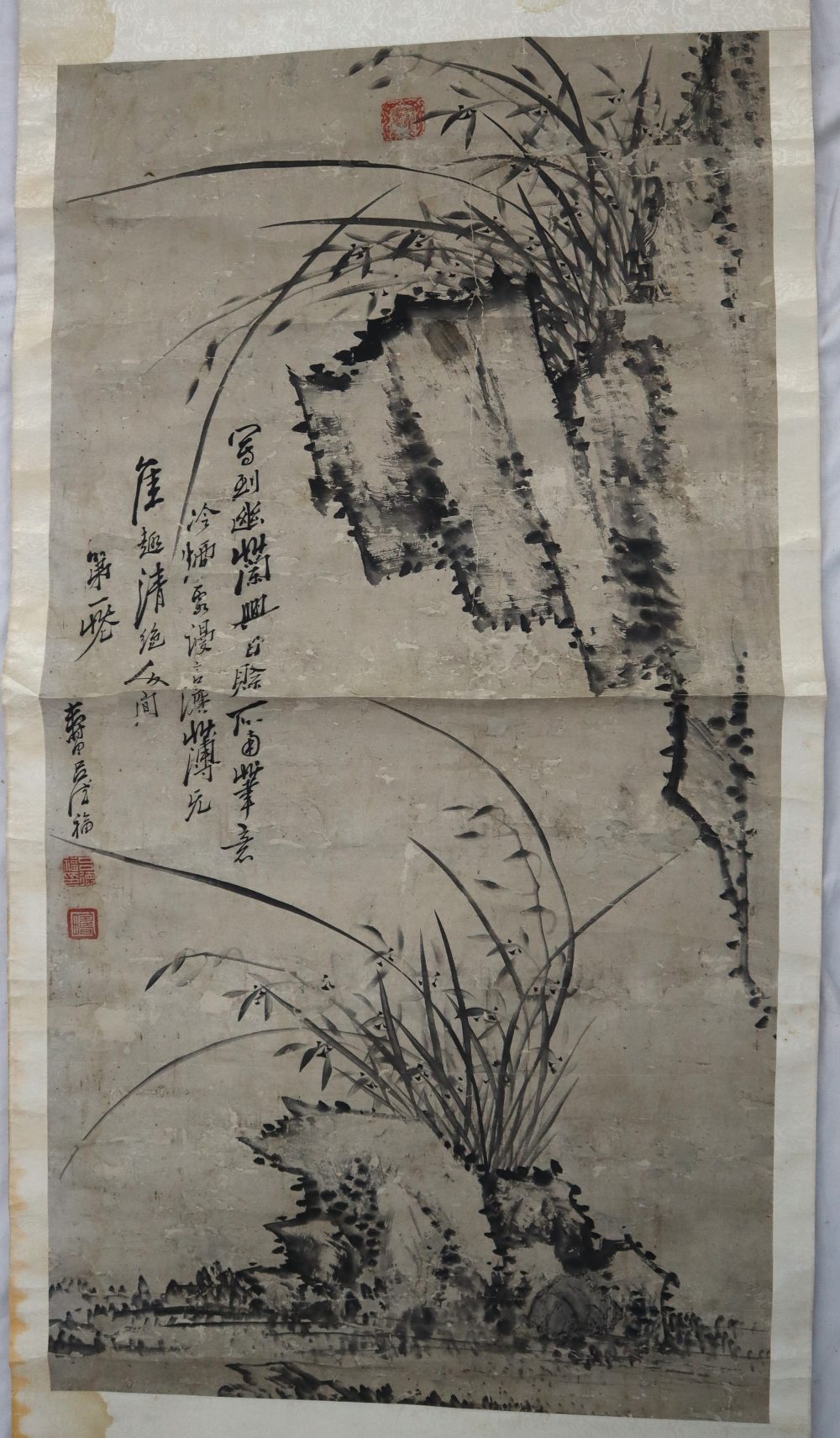 A Chinese monochrome watercolour scroll decorated with grasses, seal marks, 108 x 56.