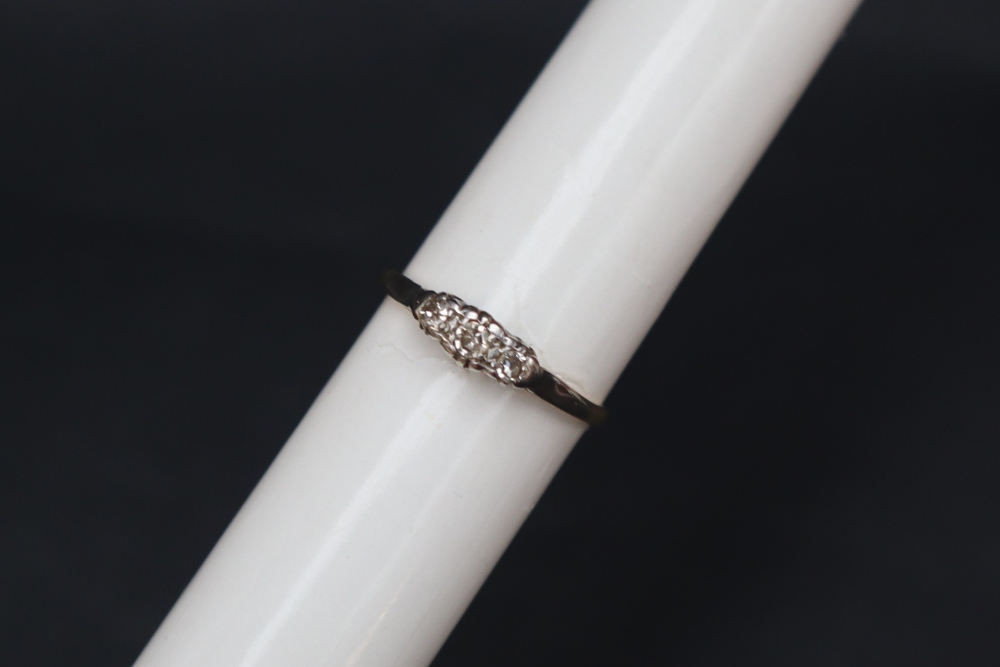 A three stone diamond ring,