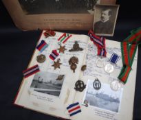 A set of four World War II medals including The War Medal, The Defence Medal,