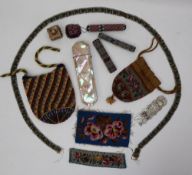 A mother of pearl glasses case together with bead work purses,
