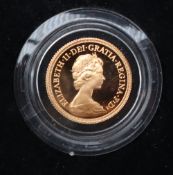 An Elizabeth II proof gold sovereign, dated 1979, encapsulated in plastic,