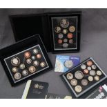 A 2012 United Kingdom proof coin set together with a 2011 and 2010 proof coin set and a Silver