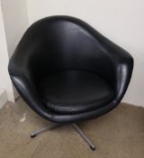 A mid-20th century Kanari black vinyl swivel chair,