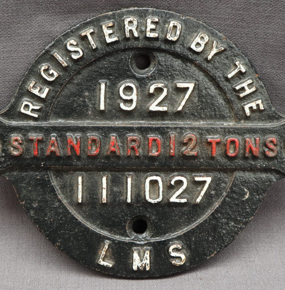 A railway wagon plate for LMS 111027, 1927, Standard 12 tons, of circular form with central strap, - Image 2 of 4