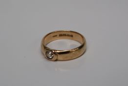 An 18ct yellow gold ring, set with an old cut diamond, size x, approximately 9.