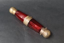 A Sampson Mordan & Co cranberry glass and gilt metal mounted double ended scent bottle,