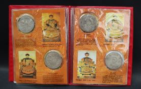 A set of twelve coins / tokens to commemorate the twelve emperors from Nurhaci to Xuantong,