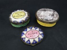 A Bilston enamel patch box, the oval lid decorated with a frame,