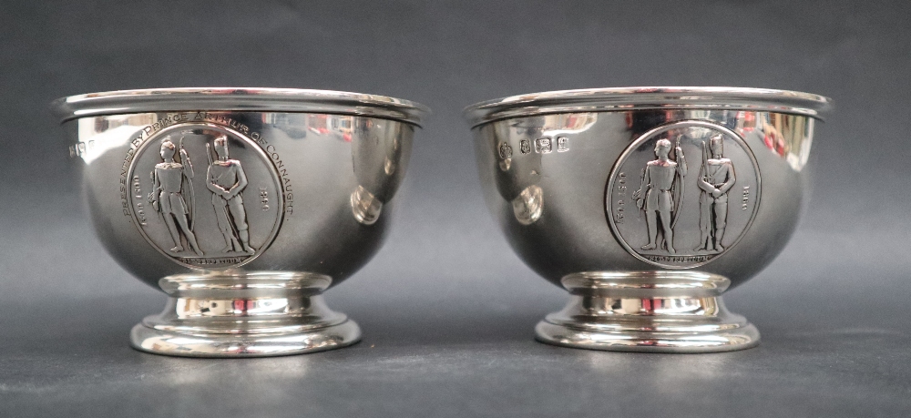 A pair of Edward VII silver pedestal bowls, for The National Rifle Association, Birmingham, 1905,