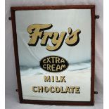 A Fry's Extra Cream milk chocolate advertising mirror, in a wooden frame,
