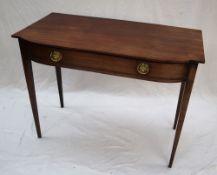 A 19th century mahogany side table with a D shaped top above a single drawers on square tapering
