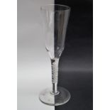 A 19th century wine glass with a tall tapering bowl and double helix cotton twist stem on a