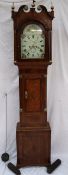 A 19th century oak longcase clock, the hood with a broken swan neck pediment with brass finials,