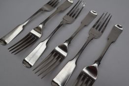 A set of six George III silver fiddle pattern table forks, London, 1810, Alexander Hewat,