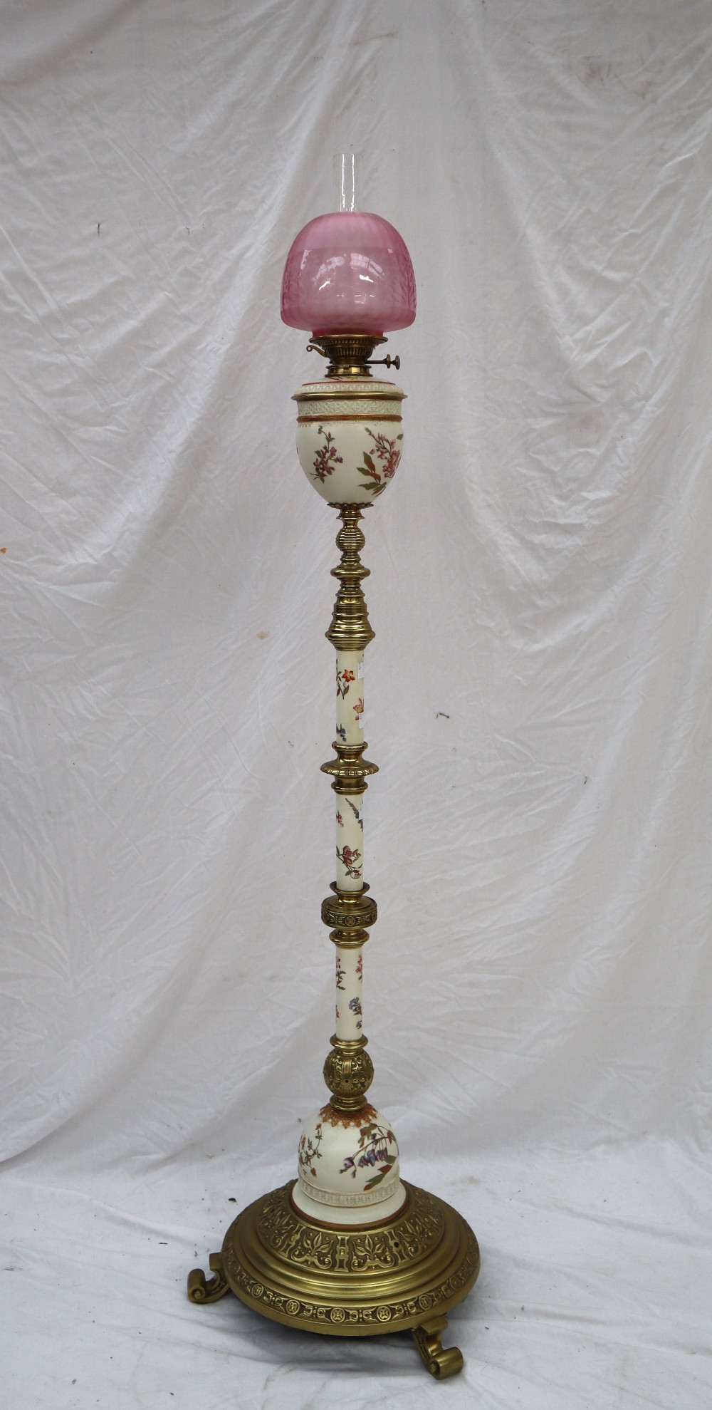 A Royal Worcester porcelain and brass standard oil lamp,