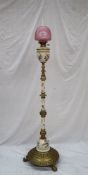 A Royal Worcester porcelain and brass standard oil lamp,