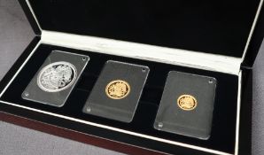 A 2018 Angel three coin set comprising a 1oz au.999 silver medallion, a 1/4 ounce au.