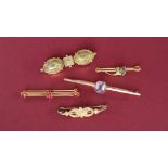 A Victorian 15ct gold bar brooch approximately 5 grams together with a 9ct gold amethyst and seed