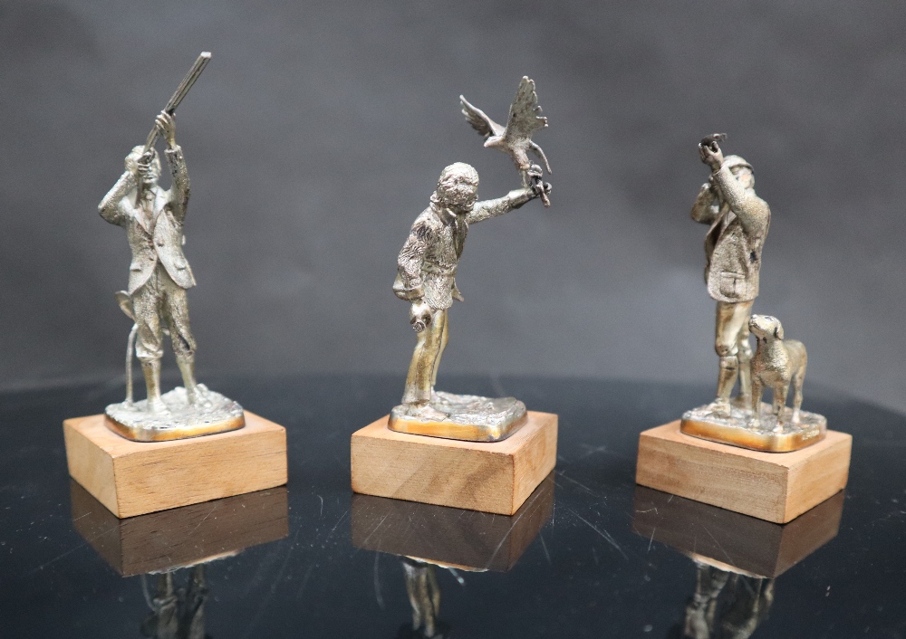 A set of nine Elizabeth II silver sportsmen figures including The Falconer, The Squire, The Poacher, - Image 4 of 10