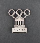 Olympics - A Berlin 1936 Olympic Games judge's badge, In silvered bronze, 41x45mm, by Lauer.