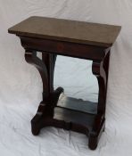 A Victorian mahogany marble topped console table with a frieze drawer and scrolling supports on bun