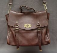 A Mulberry brown leather satchel handbag, with a braided handle,