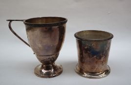 An Elizabeth II silver pedestal christening mug, with an angular shaped handle, Sheffield, 1951,