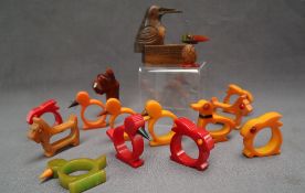 A set of five bakelite novelty napkin rings in the form chicks together with a set of four rabbit