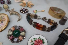 A Scottish hardstone bracelet, set with banded agates and cornelian to white metal bands,