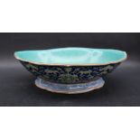 A Chinese porcelain bowl, with a turquoise interior,