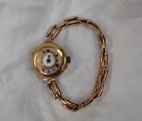 A 15ct yellow gold lady's half hunter wristwatch,