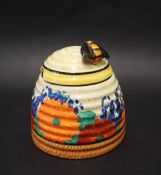 A Clarice Cliff Gayday pattern beehive preserve pot and cover,