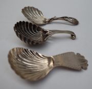 A George III silver caddy spoon, with a splayed handle and a shell shaped bowl, London, 1796,