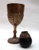 An Edward VII silver goblet, with a leaf cast body and ring turned column on a spreading foot,