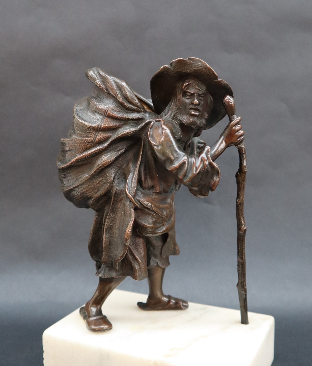 A bronze model of an elderly man with an open sack on his back, - Image 2 of 7
