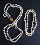 A double string of cultured pearls to a 9ct gold clasp, 45.