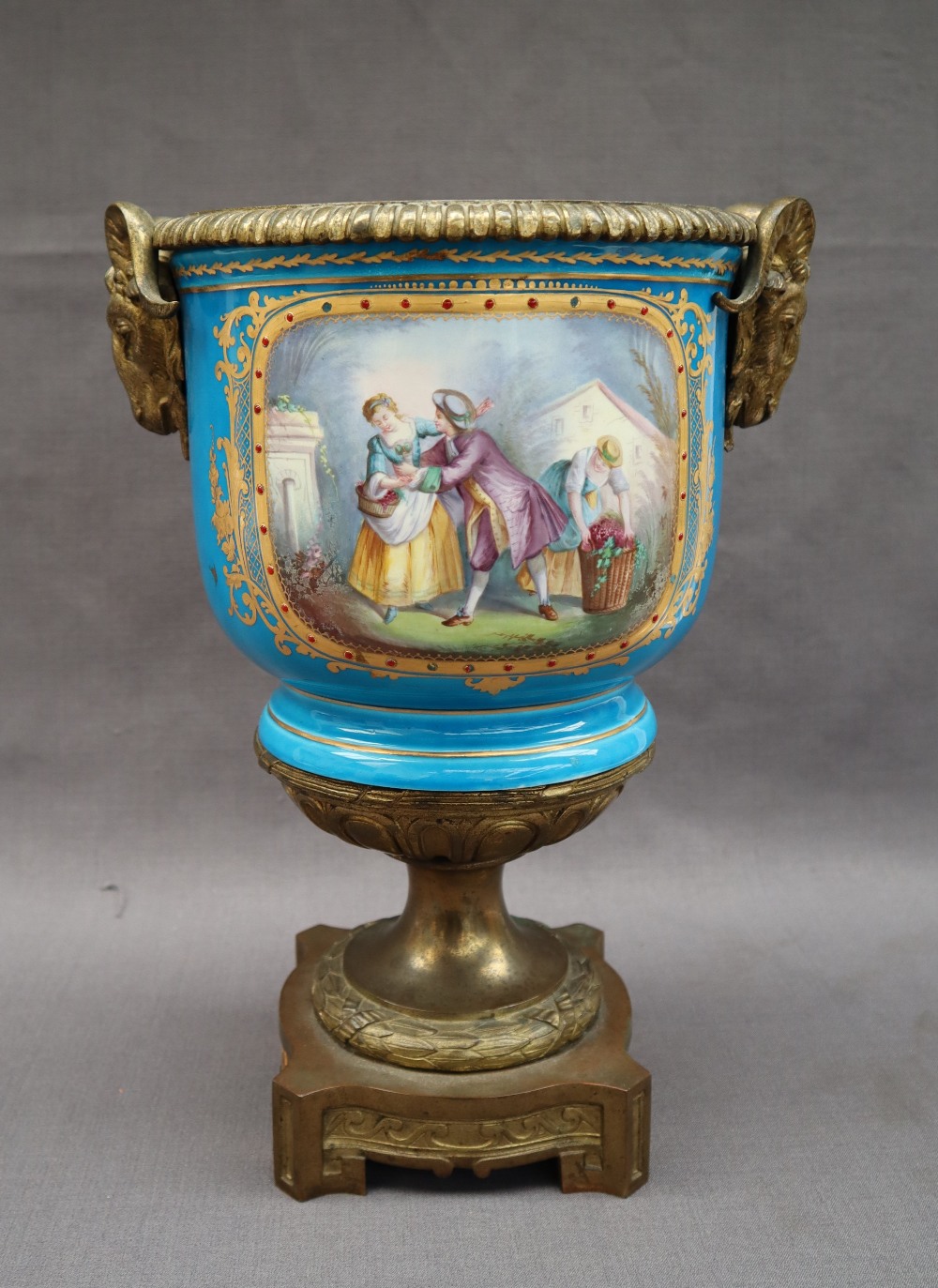 A 19th century Sevres style jardiniere mounted as a vase with an gilt metal mounted rim,