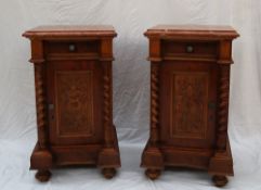 A pair of Victorian walnut marble topped bedside cabinets,