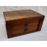 A Dixon electroplated part flatware service in three tiers contained in an oak cabinet,