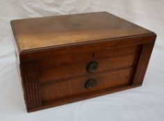 A Dixon electroplated part flatware service in three tiers contained in an oak cabinet,