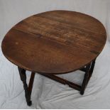 A 19th century oak gateleg dining table,
