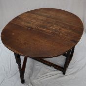 A 19th century oak gateleg dining table,