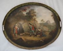 A 19th century Pontypool toleware japanned twin handled gallery tray of oval form painted to the