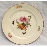 A Berlin porcelain plate with a cerise line rim decorated to the centre with a bouquet of flowers