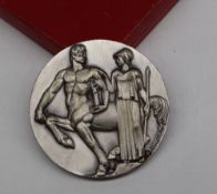International Amateur Athletics Federation - a white metal medallion by D Manetti for "Comitat